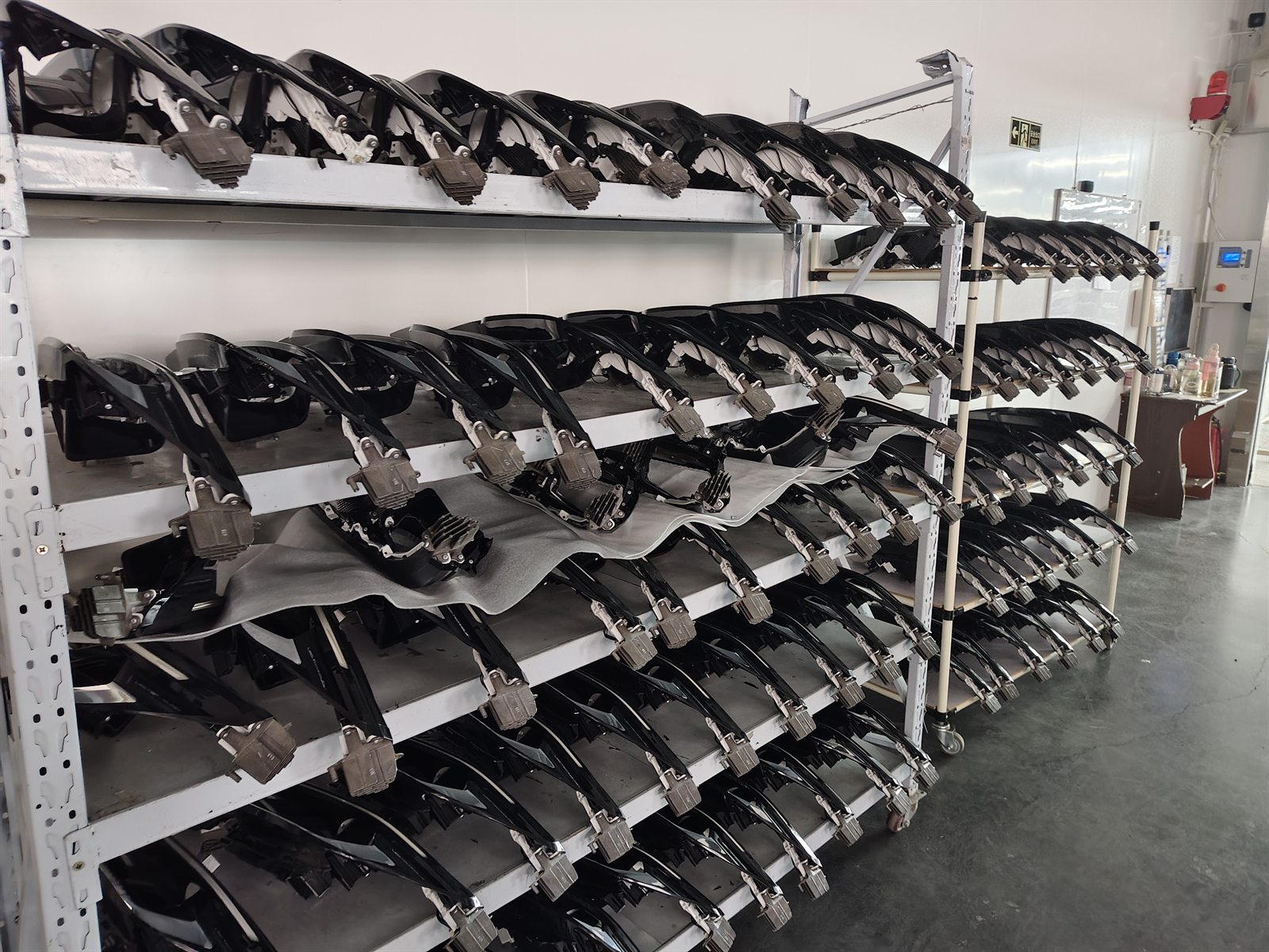 Rows of automotive electronic components at an independent supplier facility