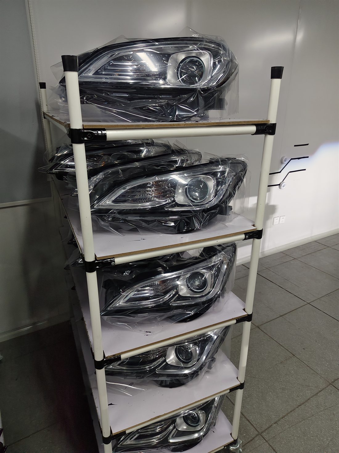 Automotive headlamp assemblies inspected during a supplier visit